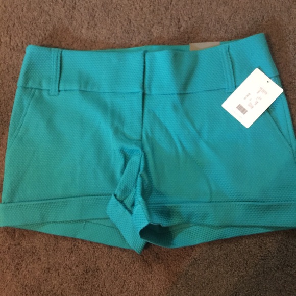 Maurice's blue shorts