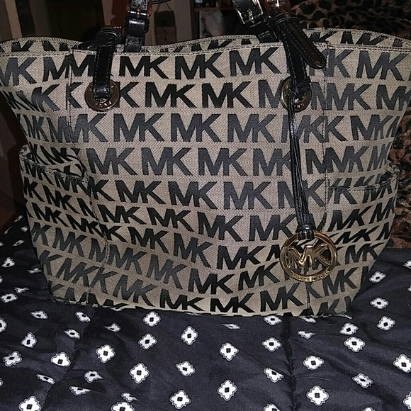 Brown and black Micheal Kors tote