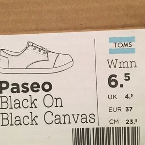 Toms black canvas shoes