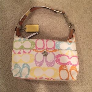 Like New Coach scribbles handbag