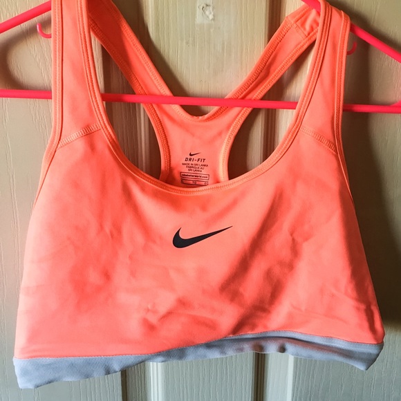 Neon coral Nike sports bra size xl.
