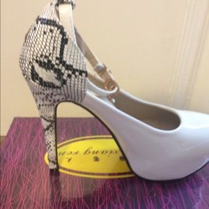 Brand new snake skin heels