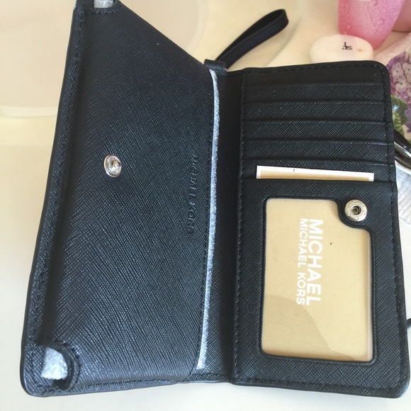 Sold Michael Kors wristlet with phone case - Picture 2 of 3
