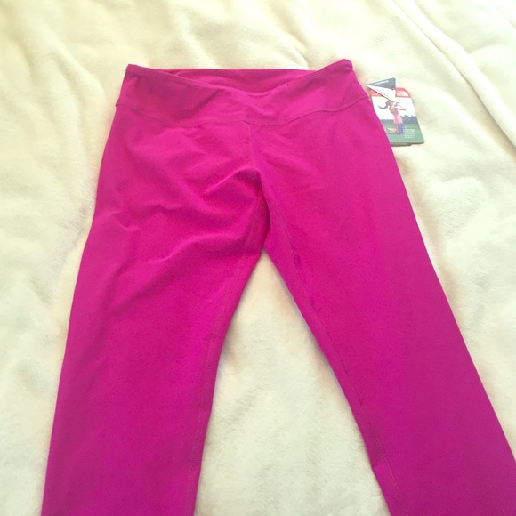 Pink/purple North Face leggings NEVER WORN!