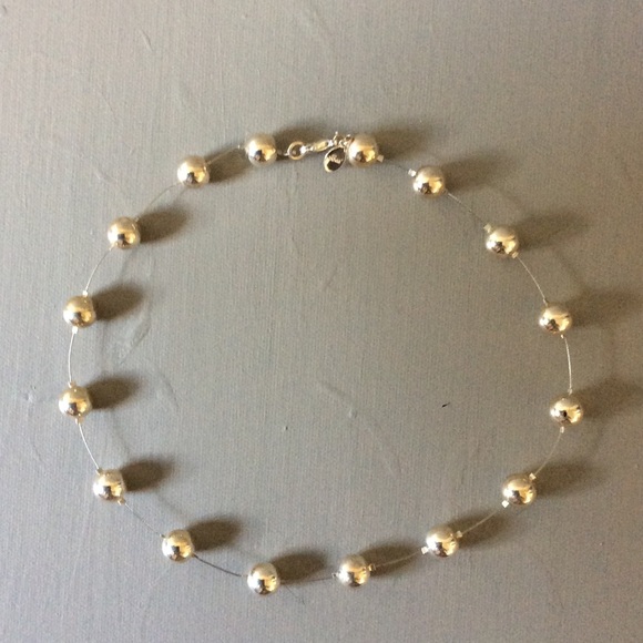 Tarnished antique silver bead choker.
