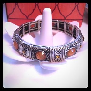 Stretchy silver and orange bracelet