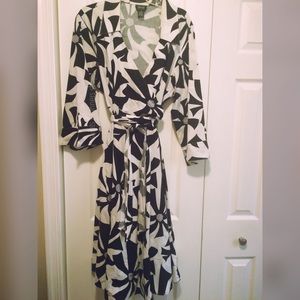 Plus size black and white faux wrap dress