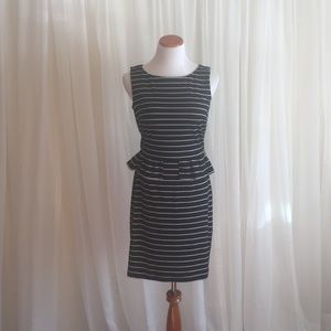 Black and white striped peplum dress