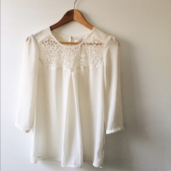 Anthropologie HD in Paris, cutout blouse.