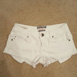 Hot Kiss white distressed shorts