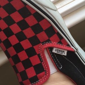 Black and red checkered slip on Vans