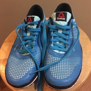 Blue Reebok tennis shoes
