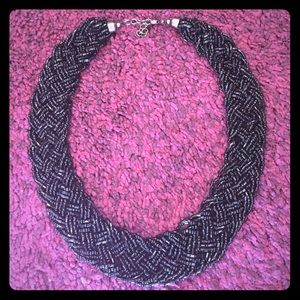 Braided black bead short necklace.
