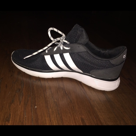 Black and white Adidas tennis shoes