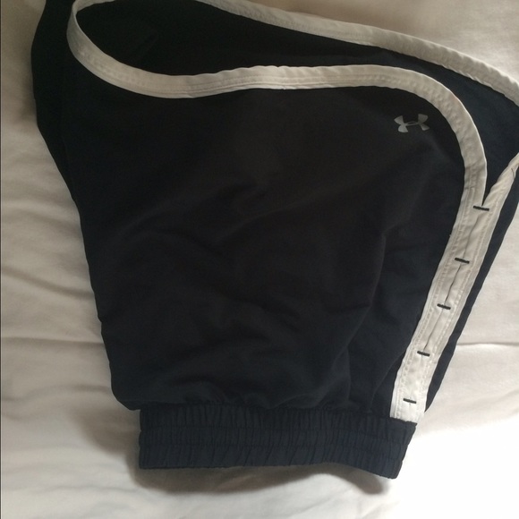 Black and white Under Armor track shorts
