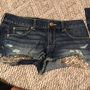 Gold Sparkle Pocketed Jean Shorts