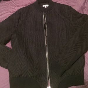 Sporty bomber style jacket w/ herring bone stitch.