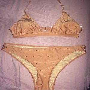 Peach 2 piece bikini with studs.