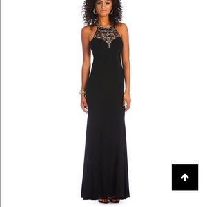 B. Darlin High-Neckline Backless Mermaid Gown