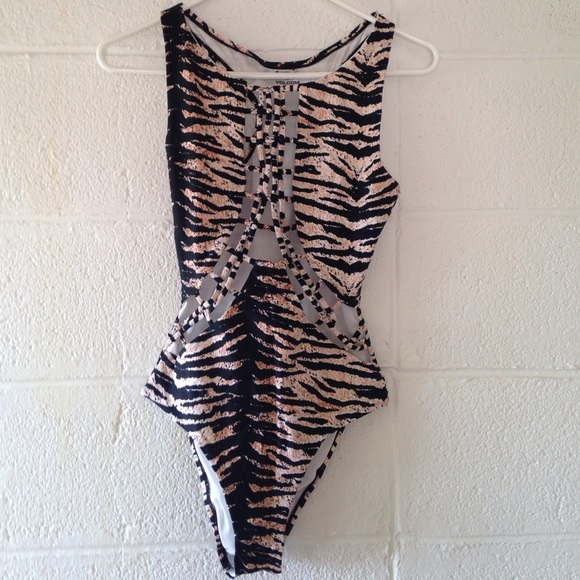 Volcom one piece swim suit, sexy braided detail