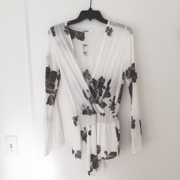 LF Other - Low-cut white floral playsuit romper. NWT