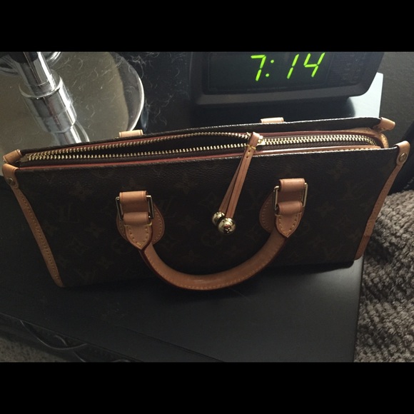 100% LV Poppincourt - Picture 4 of 4