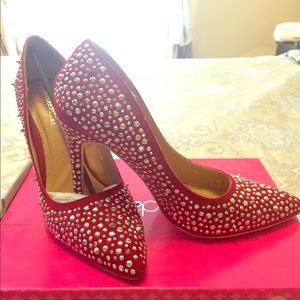 Bombshell red pump with spikes