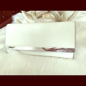 White Michael Kors clutch, white.