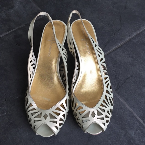 Peeptoe cutout sling backs.