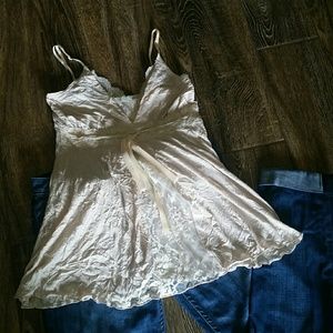 Cream baby doll tank with lace accents