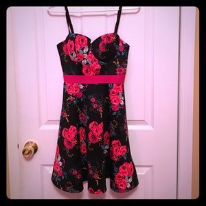Floral skater dress with corset top and caged back