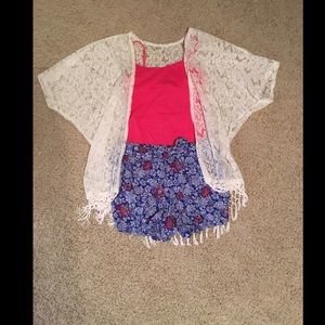 Adorable printed shorts with a bow on the front:)