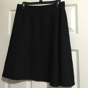 Black mid thigh skirt