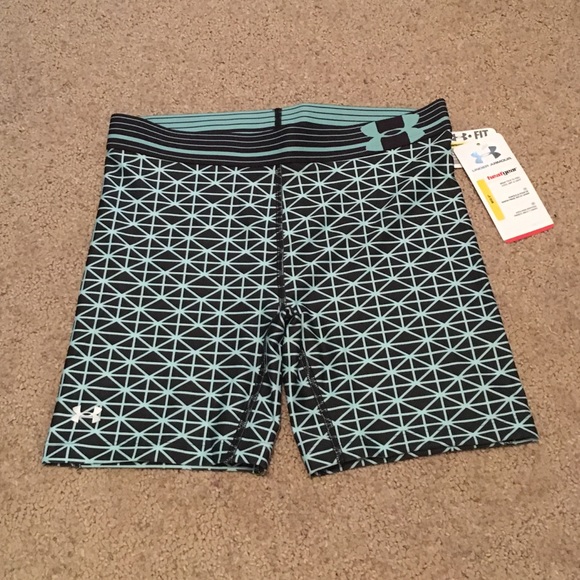 Black and blue UA compression shorts.
