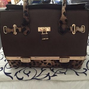 $50 Leopard print and coffee color purse.