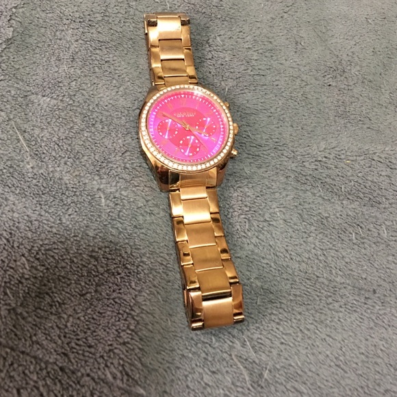 Barely worn bright pink watch with rose gold band
