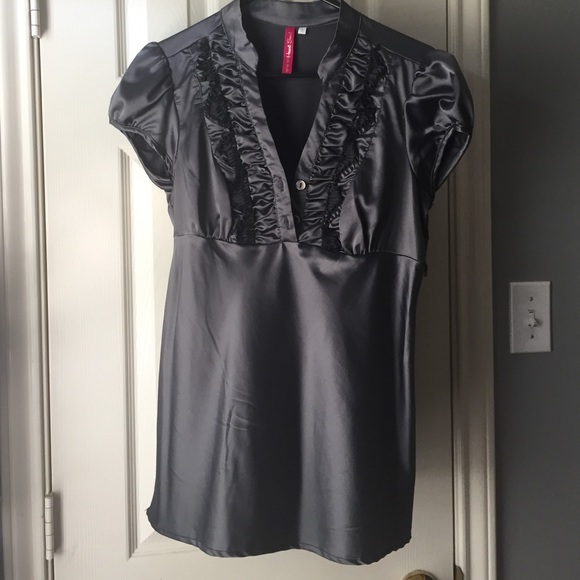 Silver blouse.