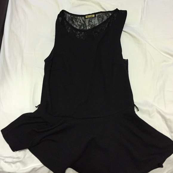 Black peplum top with lace in the back - Picture 1 of 4
