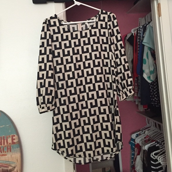 Beautiful creme white and black dress.