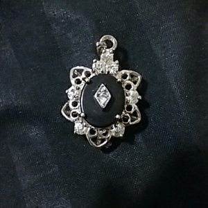 Antique black onyx and diamond pendent