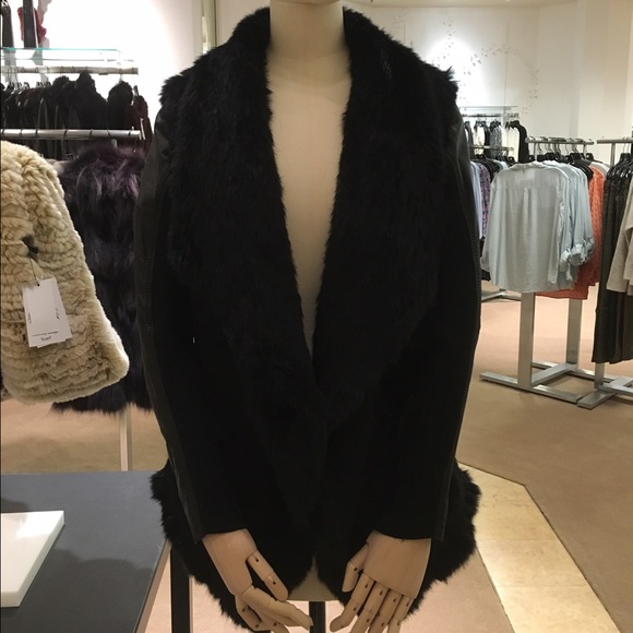 Brand new purchased from Saks fifth avenue