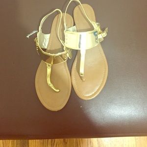 Gently used gold sandals