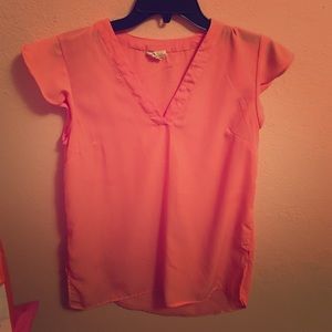 Light pink blouse; medium