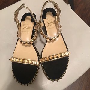 Black and gold platform sandals
