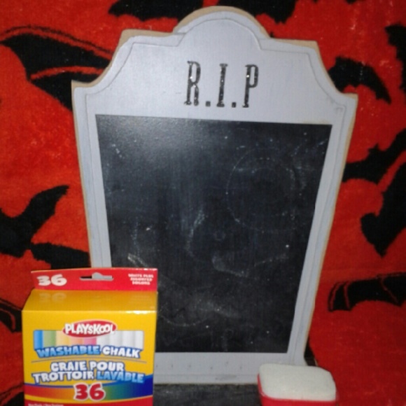 R.I.P. Chalkboard with eraser and used chalk.