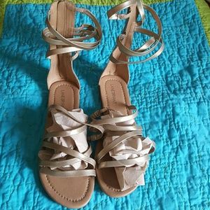 Metallic gold gladiator sandals