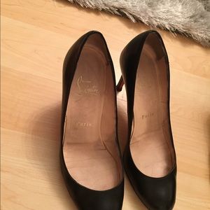 Christian Louboutin black pumps