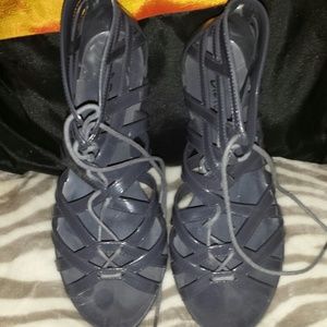 Strappy jelly shoes.