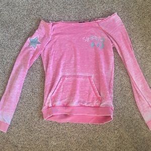 Pink jeweled hang off the shoulder top