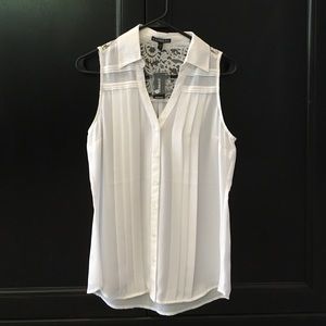 White sleeveless blouse